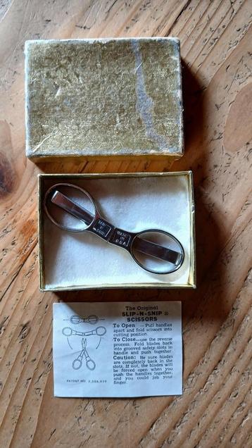 De originele Slip-N-Snip Scissors  / opvouwbare schaar beschikbaar voor biedingen