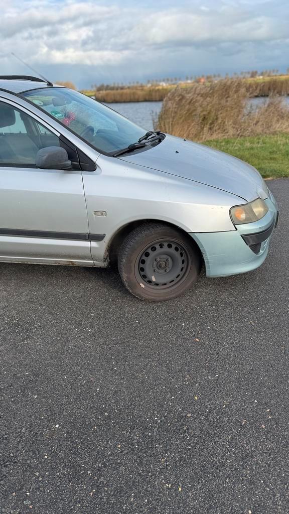 Mitsubishi Space Star 1.6 Family 2003 Grijs, Auto's, Mitsubishi, Particulier, Space Star, Benzine, D, MPV, Handgeschakeld, Origineel Nederlands