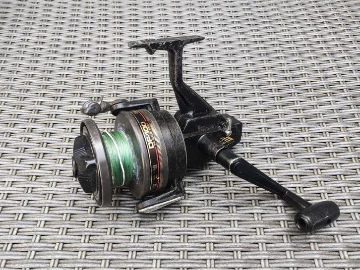 Daiwa DF-100 Zeemolen Made In Taiwan *** OLDSKOOL ***, Watersport en Boten, Hengelsport | Zeevissen, Gebruikt, Molen, Ophalen of Verzenden
