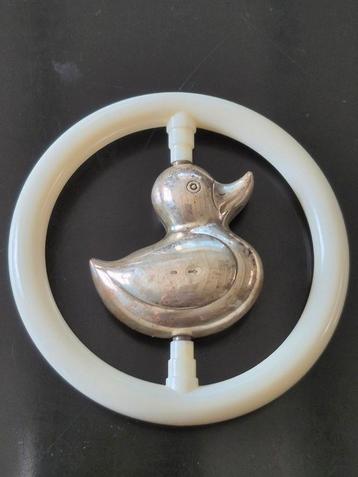 Baby rammelaar zilver wit eend beschikbaar voor biedingen