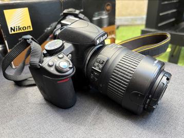Nikon D3100 + AF-S DX NIKKOR 18-55mm + filter + statief beschikbaar voor biedingen