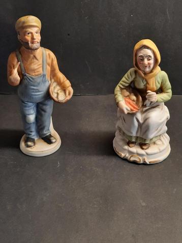 Beeldjes Opa en oma met groente en vis beschikbaar voor biedingen