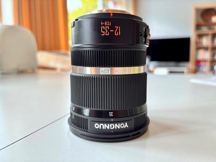Yongnuo YN12-35mm F2.8-4M zoomlens (MFT, Olympus/Panasonic), Audio, Tv en Foto, Fotografie | Lenzen en Objectieven, Zo goed als nieuw