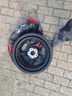 Auto reservewiel mercedes, Ophalen