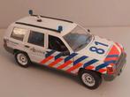 Jeep Grand Cherokee politie KLPD., Hobby en Vrije tijd, Modelauto's | 1:18, Ophalen of Verzenden, Zo goed als nieuw, Overige merken