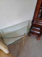 Glazen wandtafel met gouden poten, Ophalen