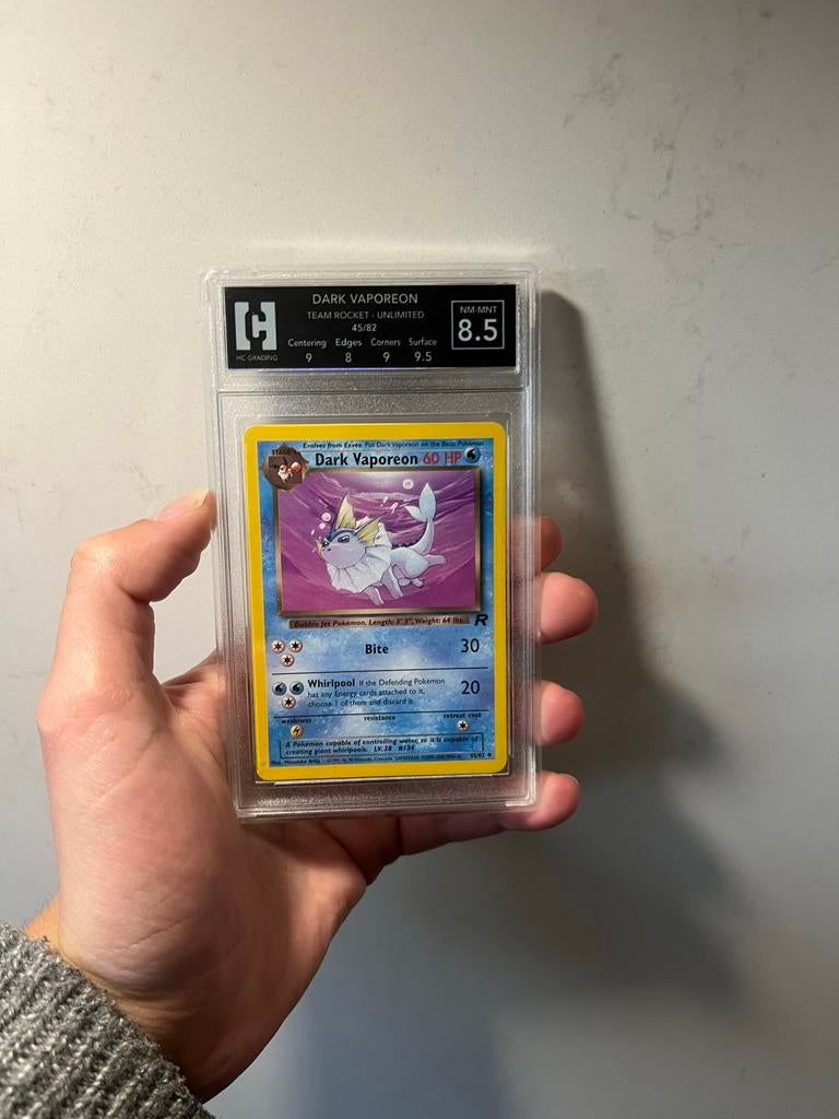 Dark Vaporeon NM-MNT 8.5 Graded Pokémon Kaart, Ophalen of Verzenden, Zo goed als nieuw, Losse kaart