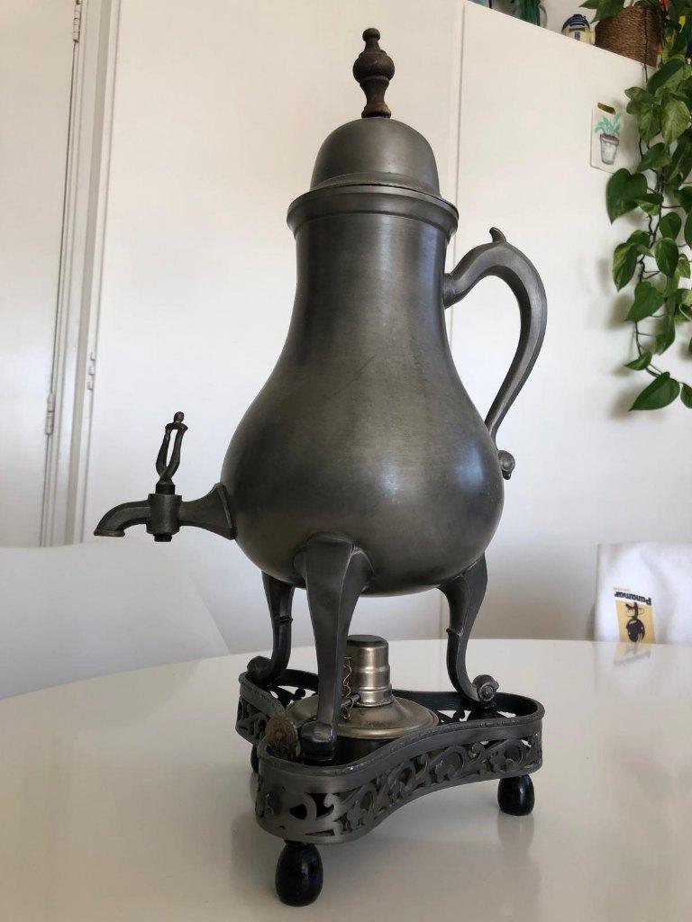 Tinnen Kraantjeskan op komfoor, Ophalen