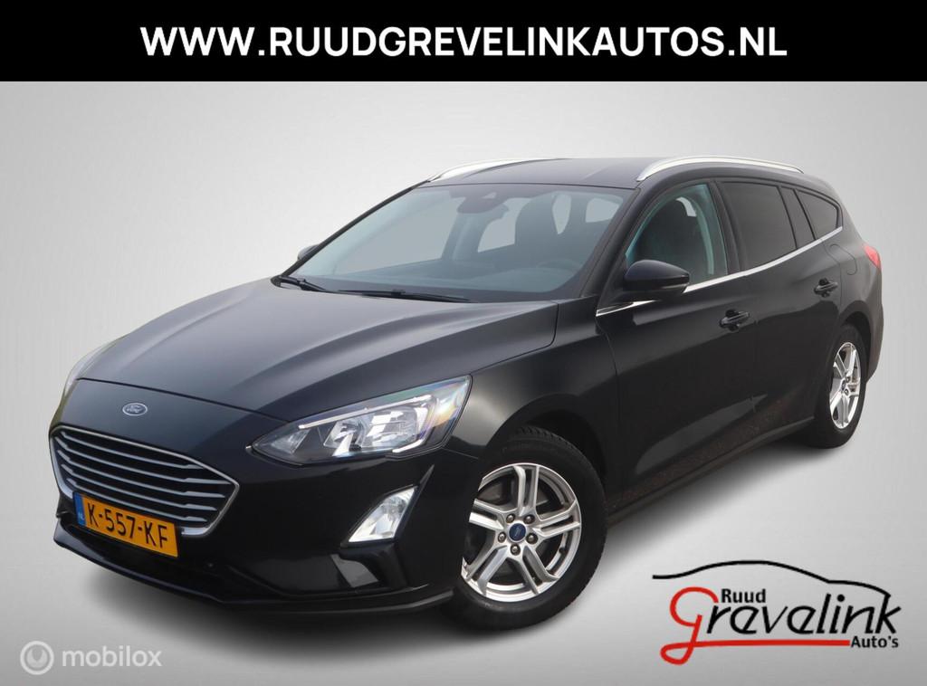 Ford Focus Wagon EcoBoost Hybrid 125 PK H6 Edition Navigatie, Stof, Gebruikt, Zwart, Origineel Nederlands