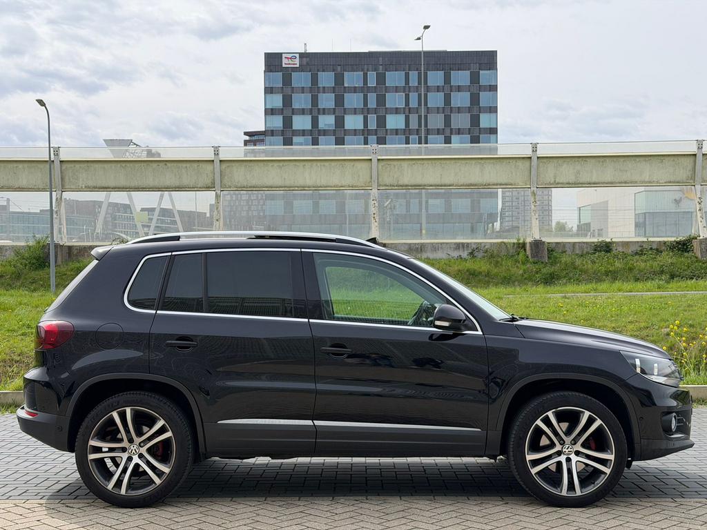 Volkswagen Tiguan 2.0TSI 132KW/180PK 4M A7 M16 2011 Zwart, Auto's, Automaat, Zwart, 4 cilinders, 1984 cc