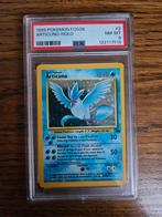 Pokemonkaarten - Articuno Fossil 2/62 PSA 8, Ophalen of Verzenden, Zo goed als nieuw, Foil