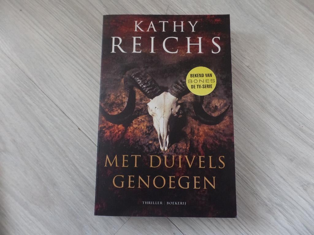 Kathy Reichs - Met duivels genoegen., Boeken, Thrillers, Zo goed als nieuw, Amerika, Ophalen of Verzenden