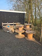 Houten kabelhaspels, Ophalen