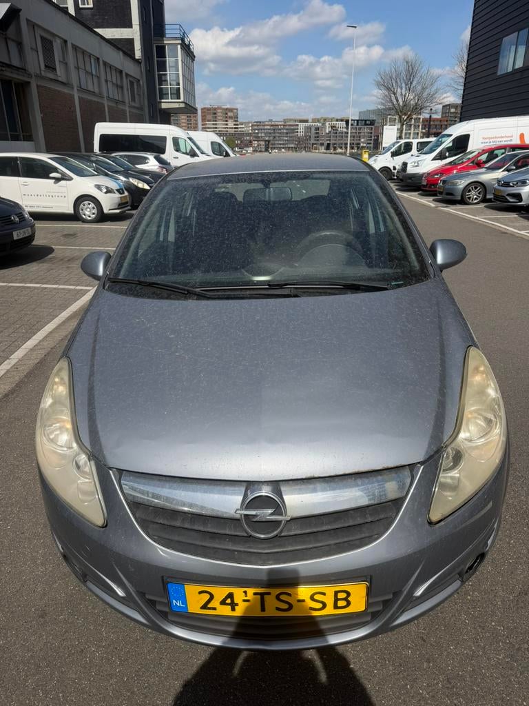 Opel Corsa 1.4 16V 5D 2007 Grijs, Auto's, Opel, Voorwielaandrijving, Euro 5, 1063 kg, 4 cilinders