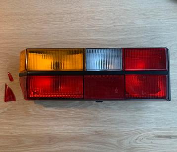 VW Golf 1 MK1 Saturnus linker achterlicht breed met defect  beschikbaar voor biedingen