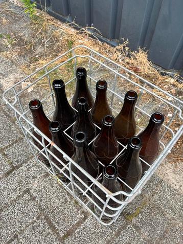 Te koop kratten met flessen beschikbaar voor biedingen