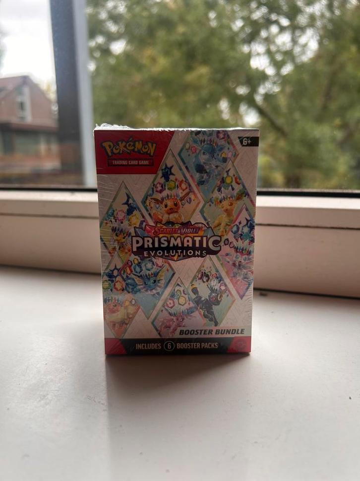 Pokemon kaarten Prismatic evolutions booster bundle, Hobby en Vrije tijd, Verzamelkaartspellen | Pokémon, Nieuw, Booster, Foil