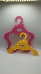 Baby Born kledinghangers, rose en geel., Kinderen en Baby's, Speelgoed | Poppen, Ophalen of Verzenden, Zo goed als nieuw