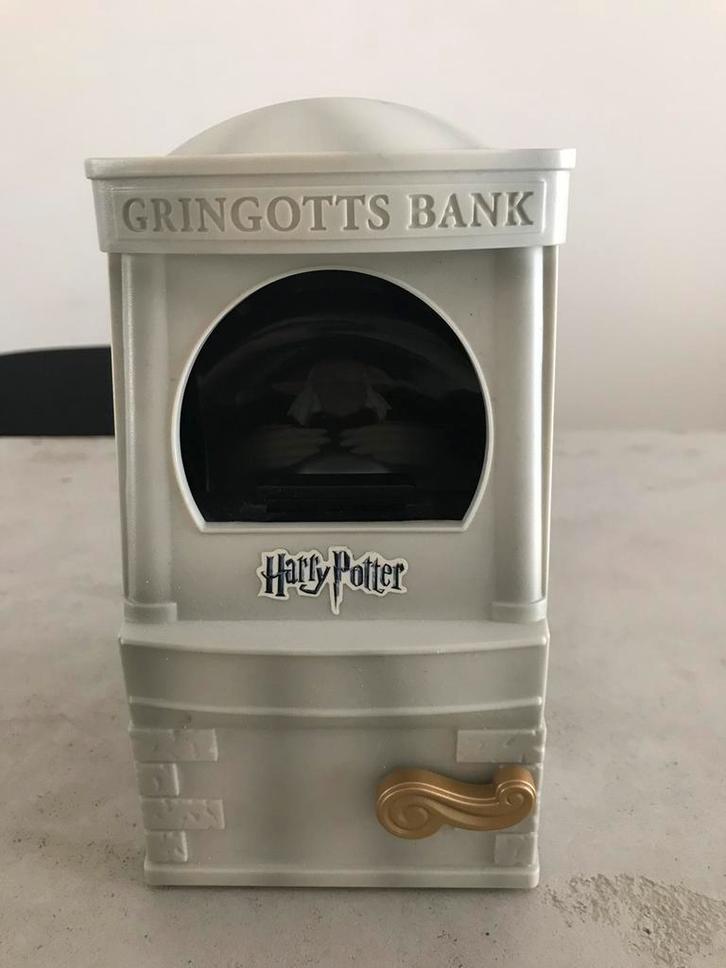 Harry Potter Gringotts bank spaarpot Tomy 2010 nieuw, Verzamelen, Harry Potter, Zo goed als nieuw, Ophalen of Verzenden