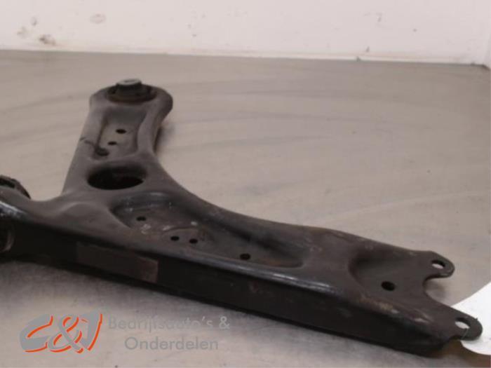 Draagarm links-voor van een Volkswagen Caddy, Auto-onderdelen, Ophanging en Onderstel, Volkswagen, Gebruikt, 3 maanden garantie