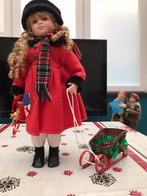 Porceleinen pop met slede., Ophalen, Zo goed als nieuw