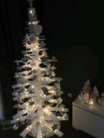 Kerstboom van hout zonder hangers, Ophalen