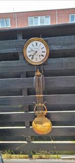 Antieke  klok, Ophalen