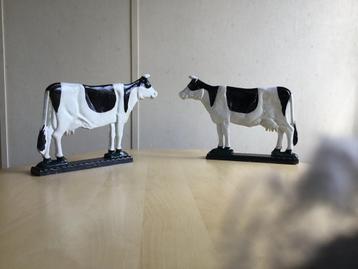 Zware Boekenstandaard Koeien beschikbaar voor biedingen