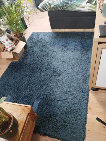 Tapijt, donker blauw beschikbaar voor biedingen