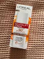 Loreal revitalift clinical anti uv fluid spf 50, Sieraden, Tassen en Uiterlijk, Uiterlijk | Gezichtsverzorging, Ophalen of Verzenden