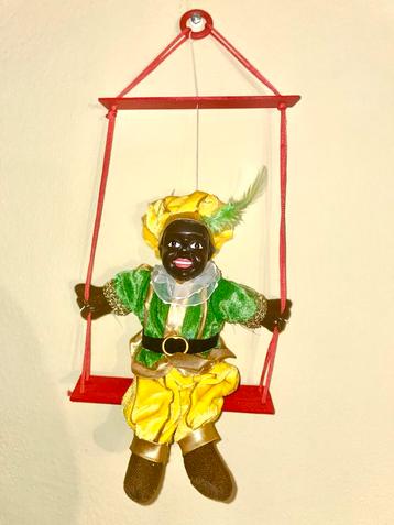 Zwarte Piet op Schommel - Verzamelobject beschikbaar voor biedingen