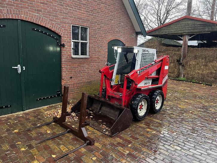 Gehl schranklader, bobcat met mestvork, Zakelijke goederen, Machines en Bouw | Kranen en Graafmachines, Wiellader of Shovel, Ophalen