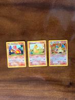 Pokemon Base Set Trio - Charmander, Charmeleon, Charizard, Ophalen of Verzenden, Gebruikt, Losse kaart
