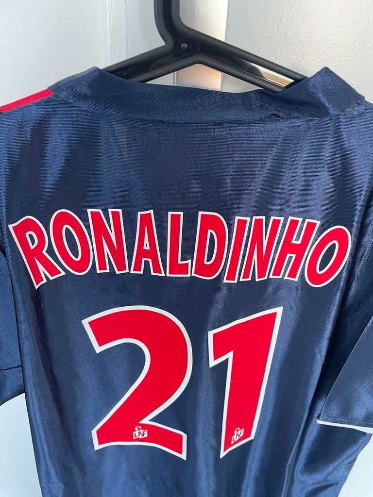 Ronaldinho PSG Shirt Retro - Maat L retro barca milan brazil, Ophalen of Verzenden, Nieuw, Maat 52/54 (L), Blauw