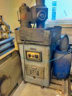 komslijpmachine, Ophalen