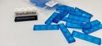 Lego 1x4 Tile transparant donkerblauw per 25 st. (Nieuw), Lego Systems A/S, Verzenden, Lego, Aastvej 1 7190 Billund Denemarken