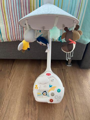 Mobiel met projectie tiny love beschikbaar voor biedingen