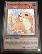 Kidmodo Dragon - Common 1st Edition, Verzenden, Nieuw, Losse kaart, Foil