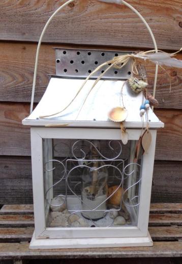 Groot wit /zilver windlicht in  45x29cm beschikbaar voor biedingen