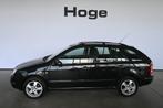 Skoda Fabia Combi 1.4-16V Choice Airco Cruise control PDC El, Auto's, Voorwielaandrijving, Gebruikt, Zwart, 4 cilinders