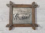 Een decoratief wandbord van ploegende boer met paarden, Huis en Inrichting, Woonaccessoires | Wanddecoraties, Ophalen of Verzenden