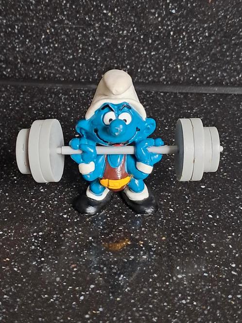 Leuk uit verzameling vintage smurf gewichtheffer jaren 80, Verzamelen, Smurfen, Zo goed als nieuw, Poppetje, Figuurtje of Knuffel