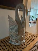 Beeld zwaan, Ophalen