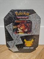 Lance's Charizard Celebration Tin - Nieuw!, Ophalen of Verzenden, Nieuw, Overige typen, Foil