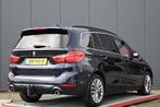 BMW 2 Serie Gran Tourer 220i High Executive trekhaak panoram, Auto's, Gebruikt, Blauw, Leder, Bedrijf