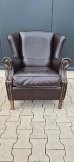Chesterfield oorfauteuil, Ophalen