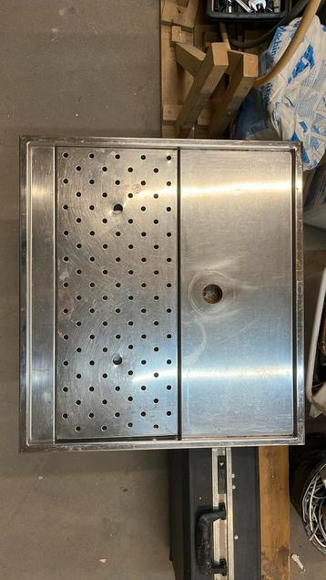 Lekbak/tapblad met afvoer beschikbaar voor biedingen