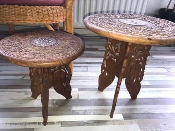 Two antique tables made of hand-carved wood
