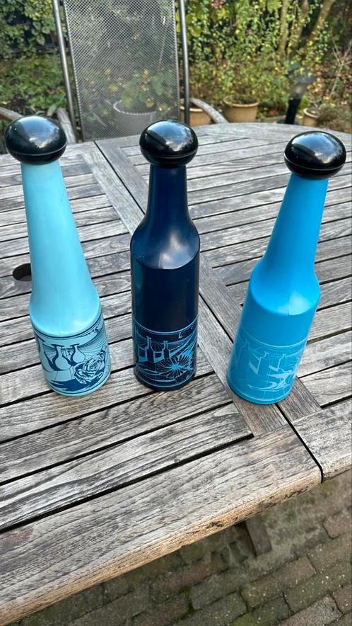 2 glazen flessen met zeefdruk Salvador Dalì, Huis en Inrichting, Woonaccessoires | Overige, Gebruikt, Ophalen of Verzenden