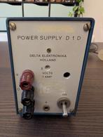 Delta D1D symmetrische voeding 15V 1A, Doe-het-zelf en Verbouw, Meetapparatuur, Ophalen of Verzenden, Gebruikt, Elektriciteit